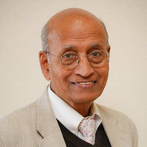 Dr. Vasant Lad smiling for camera